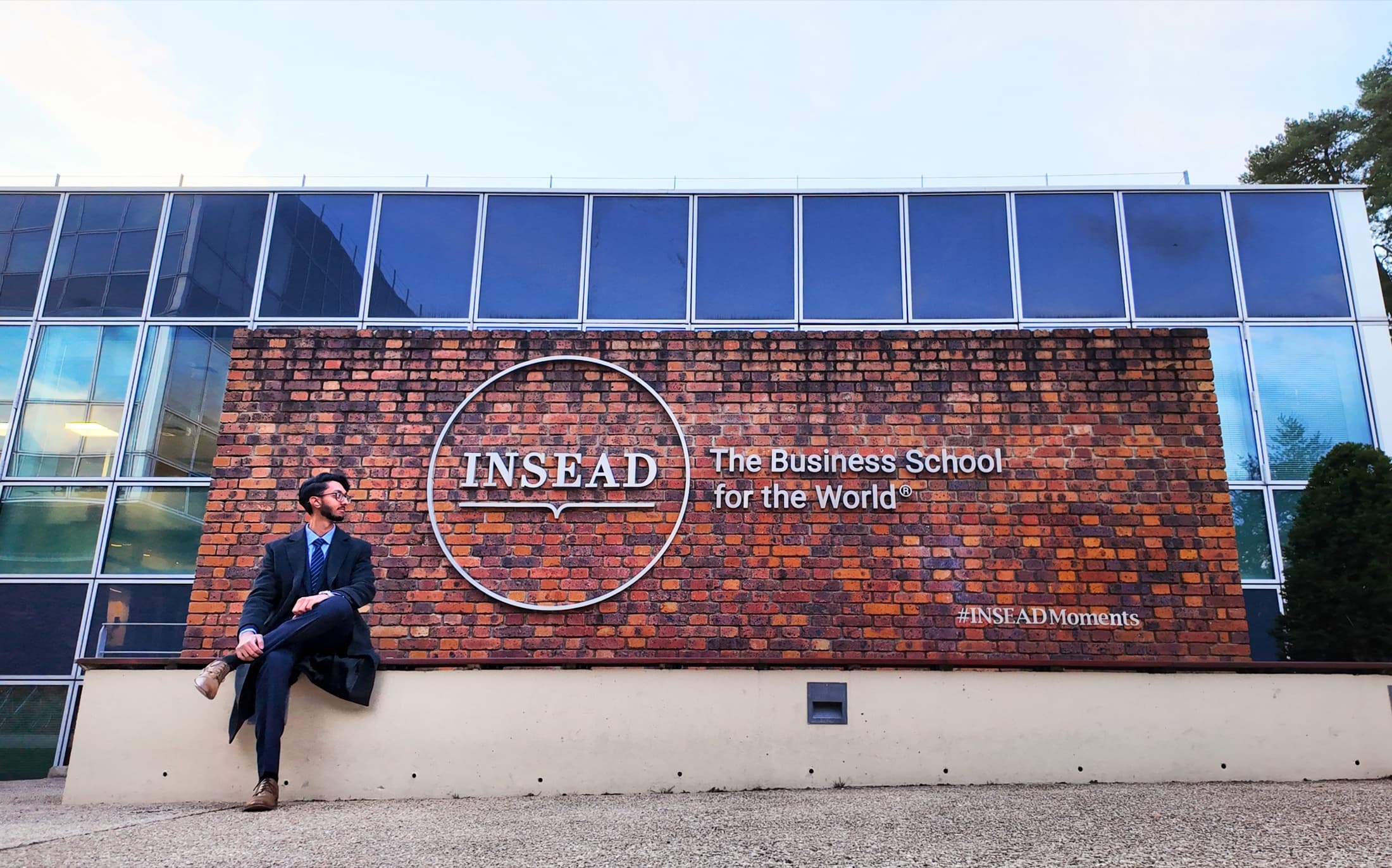 Me at INSEAD, Fontainebleau, in front of the sign